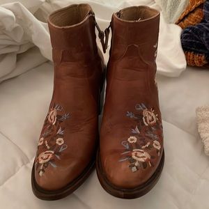 Brown Cowgirl boots with embroidery details.